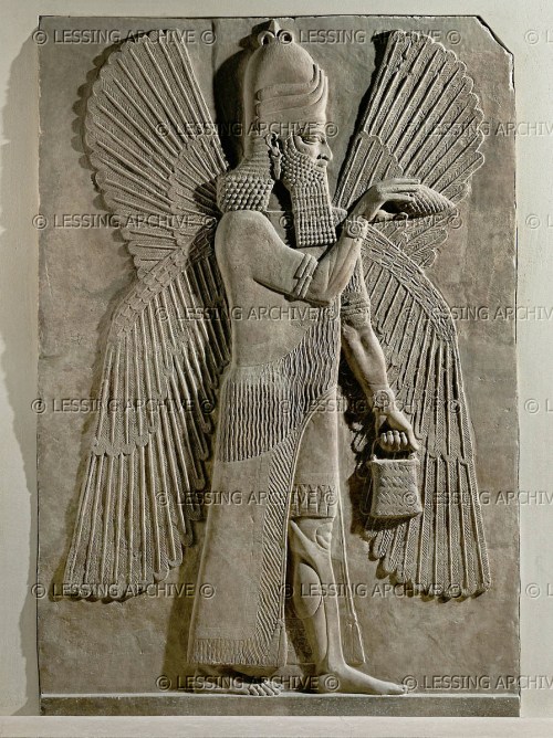 Umu-Apkallū in the characteristic act of purification, sprinkling sacred water from the Banduddu bucket with the Mullilu cone.  From Nimrud, capital of king Ashurnarzipal. AO 19845