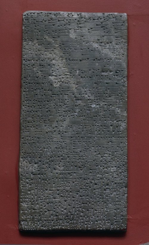 A gypsum memorial slab from the Middle Assyrian Period (1300 - 1275 BCE), findspot Kalah Shergat, Aššur.  The inscription records the name, titles and conquests of King Adad-Nirari, his father Arik-den-ili, his grandfather Enlil-nirari, and his great-grandfather Ashur-uballit I.  Memorializing the restoration of the Temple of Aššur in the city of Aššur, the text invokes curses upon the head of any king or other person who alters or defaces the monument.  The artifact was purchased from the French Consul in Mosul in 1874 for £70, the British Museum notes reference Mr. George Smith and The Daily Telegraph with an acquisition date of 1874.  Bezold, Carl, Catalogue of the Cuneiform Tablets in the Kouyunjik Collection of the British Museum, IV, London, BMP, 1896. Furlani, G, Il Sacrificio Nella Religione dei Semiti di Babilonia e Assiria, Rome, 1932. Rawlinson, Henry C; Smith, George, The Cuneiform Inscriptions of Western Asia, IV, London, 1861. Budge, E A W, A Guide to the Babylonian and Assyrian Antiquities., London, 1922. Budge, E A W, The Rise and Progress of Assyriology, London, Martin Hopkinson & Co, 1925. Grayson, Albert Kirk, Assyrian Rulers of the Third and Second Millennia BC (to 1115 BC), 1, Toronto, University of Toronto Press, 1987. http://www.britishmuseum.org/research/collection_online/collection_object_details.aspx?assetId=32639001&objectId=283138&partId=1